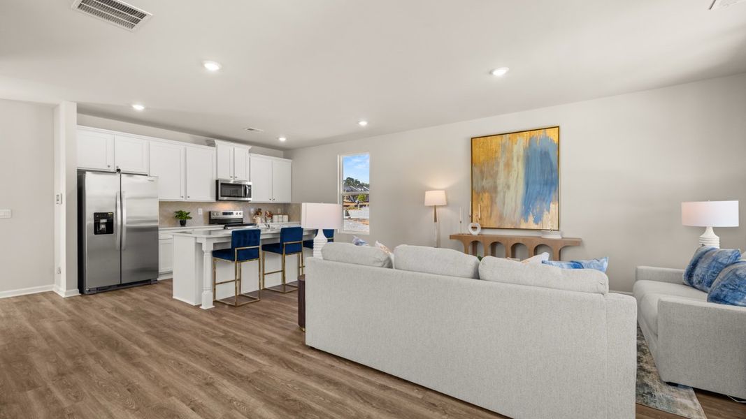 Representative furnished interior of a home built from the Iria Glen by D.R. Horton in Brookland Commons, Monroe (Image 17).
