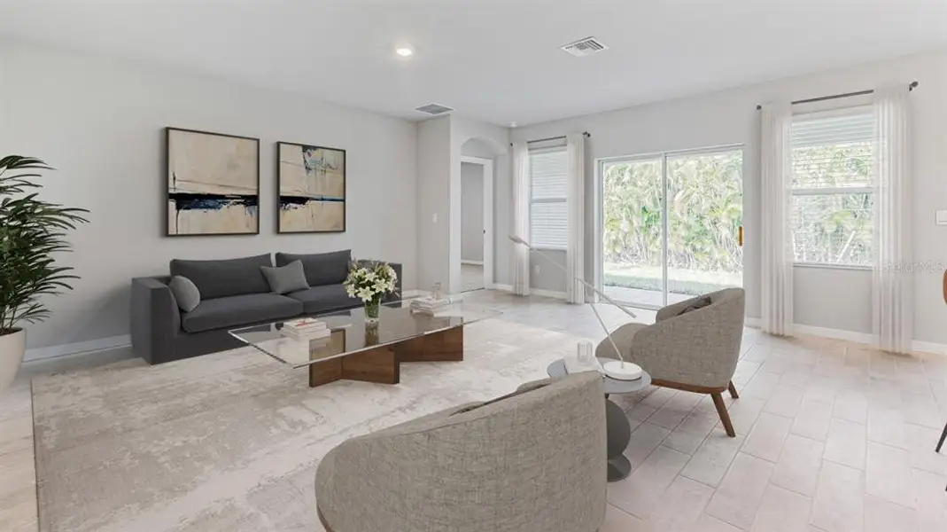 Furnished interior view inside a new home in Burnt Store Village, Punta Gorda (Image 7).