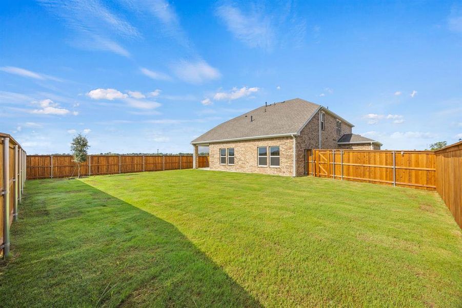 Exterior details and patio area of a home in The Estates Collection at Overland Grove, Forney (Image 3).
