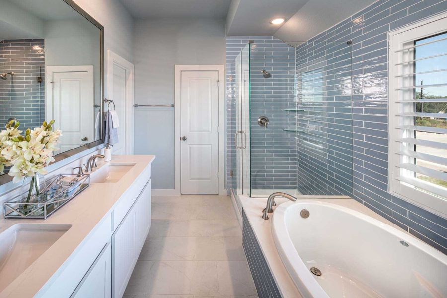Representative furnished interior of a home built from the Derby Plan by Highland Homes in Bridgeland Central: The Cottages, Cypress (Image 17).