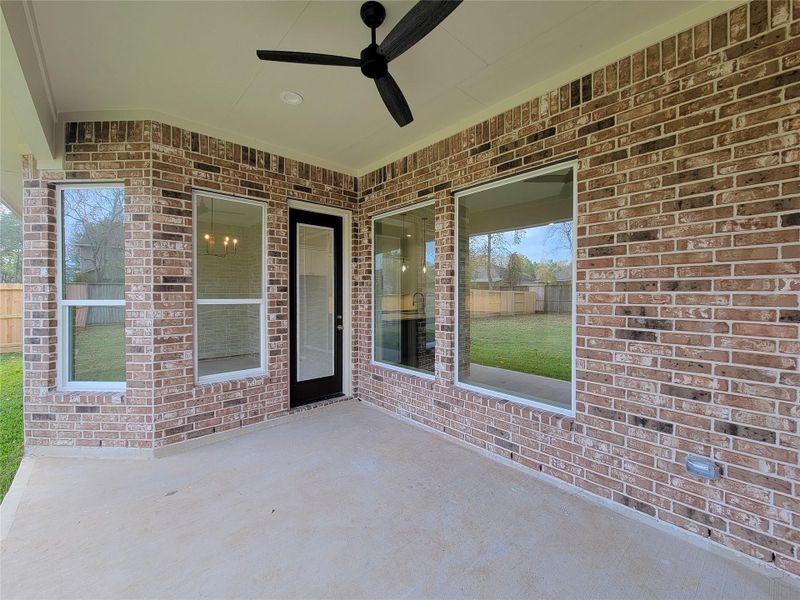 Exterior details and patio area of a home in , Conroe (Image 27).