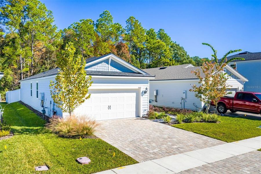 Front exterior of a new home in , St. Augustine, FL, highlighting curb appeal (Image 21).