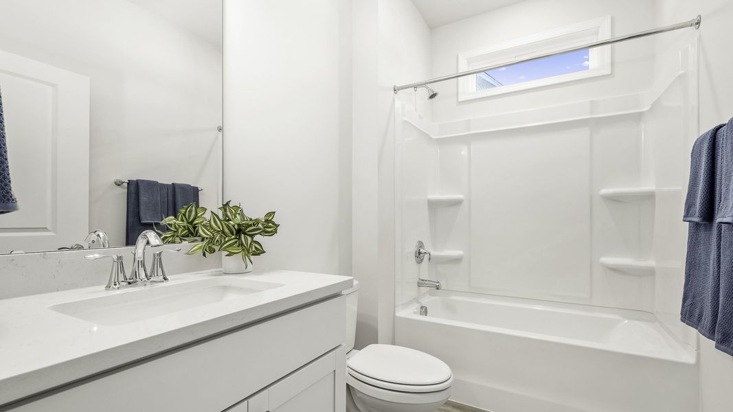 Furnished interior view inside a new home in The Villas at Kinsley, Jamestown (Image 10).