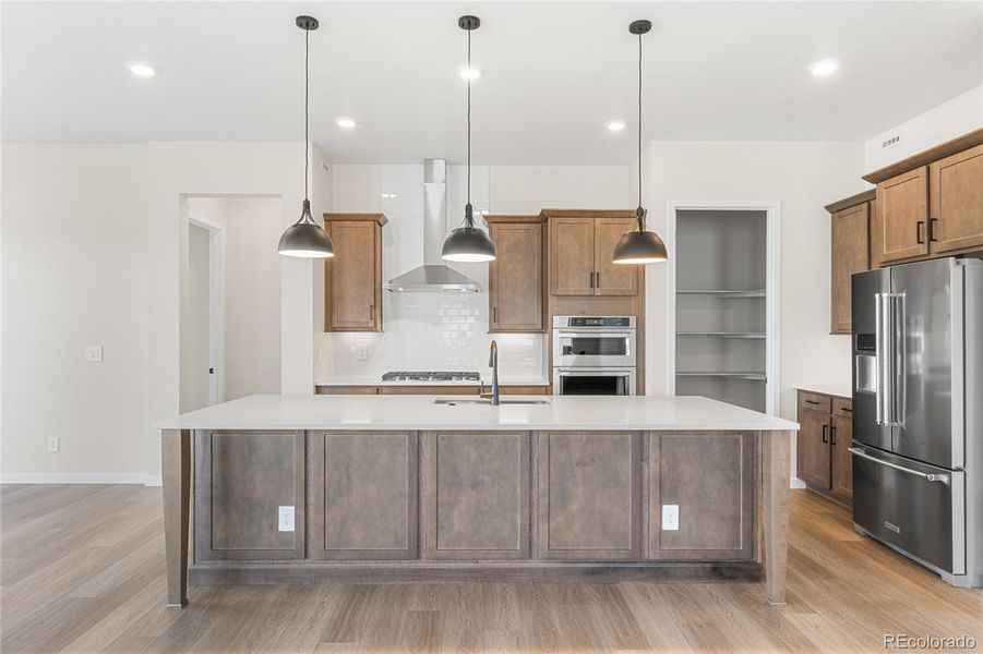 Furnished interior view inside a new home in Hilltop at Inspiration, Aurora (Image 14).