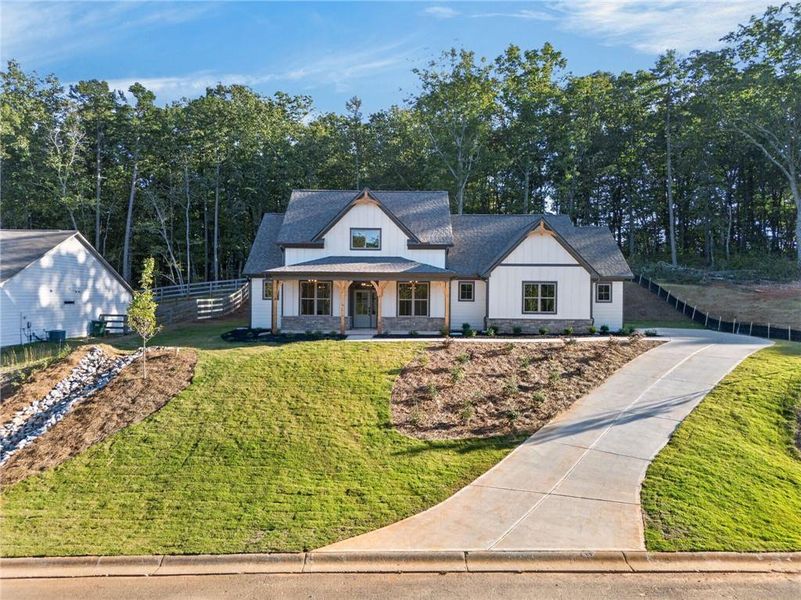 Front exterior of a new home in , Dawsonville, GA, highlighting curb appeal (Image 24).