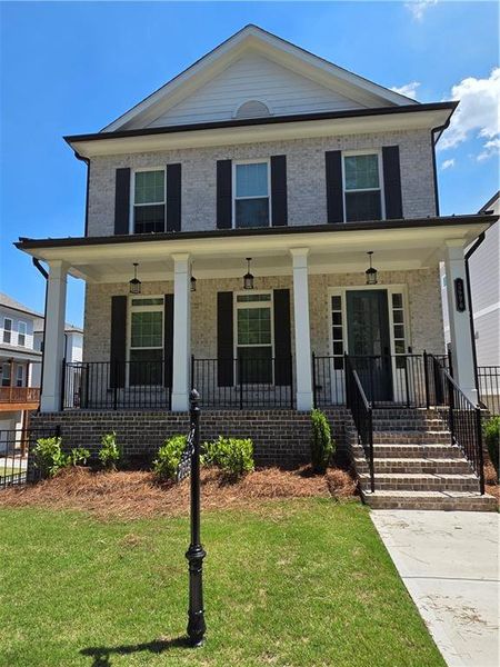 Front exterior of a new home in , Duluth, GA, highlighting curb appeal (Image 1). Front exterior of a new home in , Duluth, GA, highlighting curb appeal (Image 1).