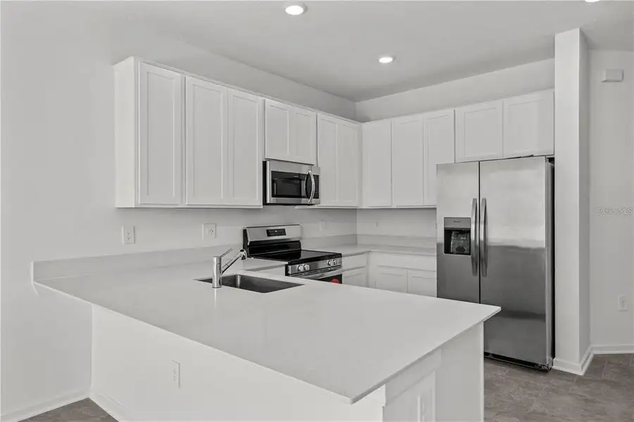 Furnished interior view inside a new home in , Davenport (Image 6).