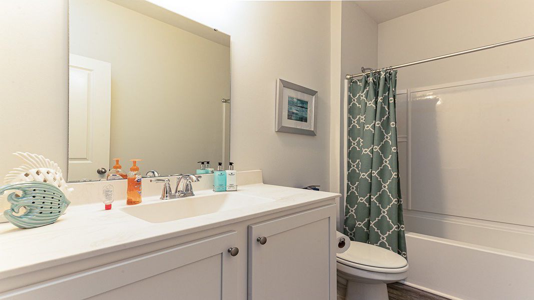 Furnished interior view inside a new home in Stanbury Creek, Supply (Image 14).