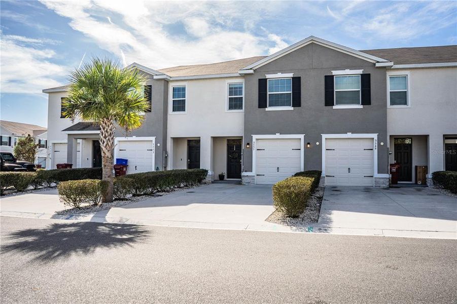 Front exterior of a new home in , Plant City, FL, highlighting curb appeal (Image 24).