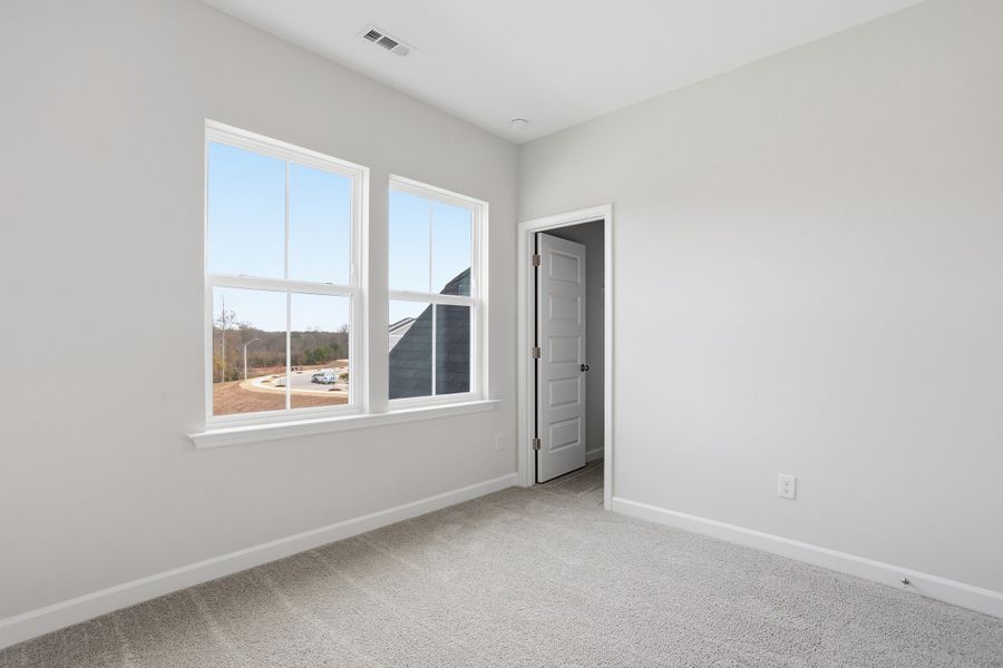 Spacious, unfurnished interior of a new home in Renaissance at White Oak, Garner (Image 23).