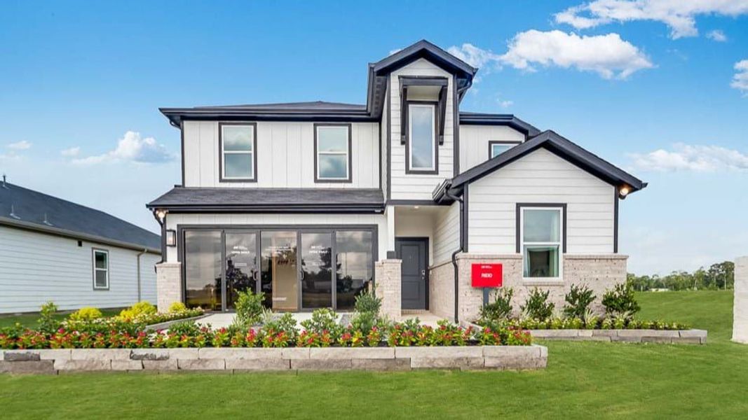 Front exterior of a home in the Brookewater 45s community, located in Rosenberg, TX (Image 12).