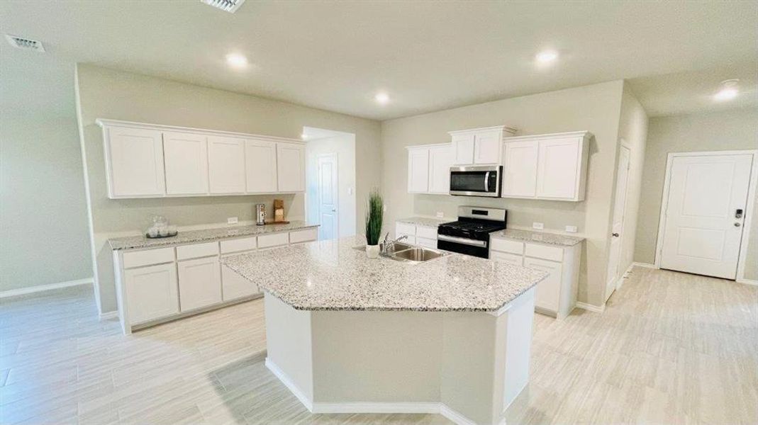 Kitchen - All Home and community information, including pricing, included features, terms, availability and amenities, are subject to change at any time without notice or obligation. All Drawings, pictures, photographs, video, square footages, floor plans, elevations, features, colors and sizes are approximate for illustration purposes only and will vary from the homes as built. Kitchen - All Home and community information, including pricing, included features, terms, availability and amenities, are subject to change at any time without notice or obligation. All Drawings, pictures, photographs, video, square footages, floor plans, elevations, features, colors and sizes are approximate for illustration purposes only and will vary from the homes as built.