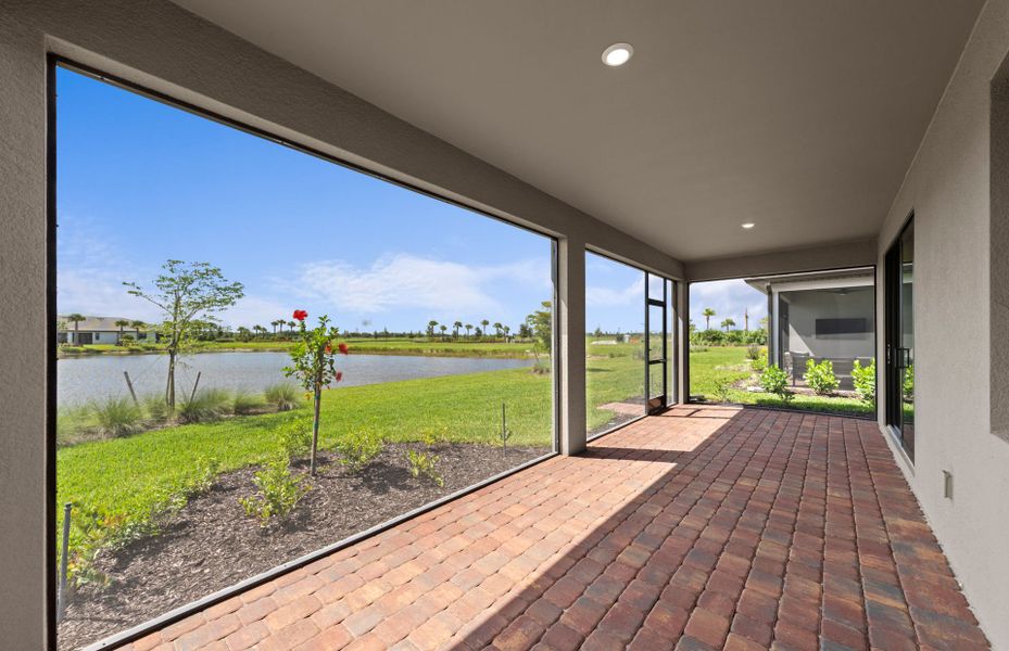 Exterior details and patio area of a home in Del Webb Naples, Ave Maria (Image 3).