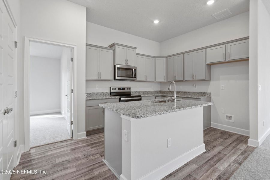 Furnished interior view inside a new home in Shadow Crest at Rolling Hills, Green Cove Springs (Image 7).