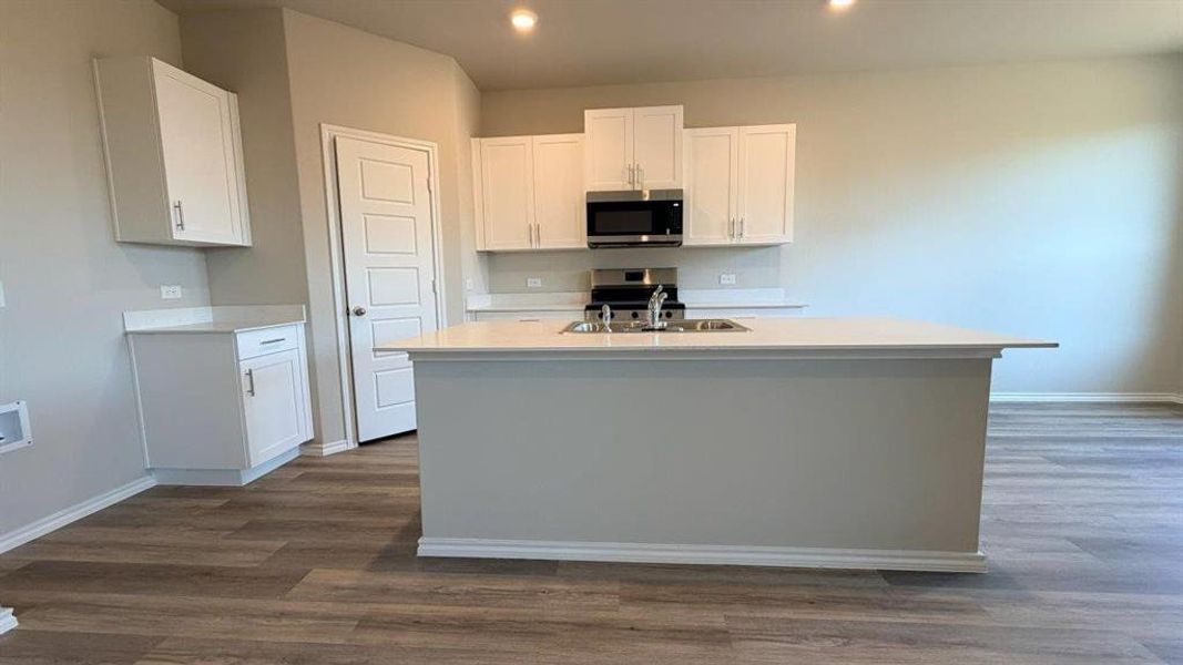 Kitchen - All Home and community information, including pricing, included features, terms, availability and amenities, are subject to change at any time without notice or obligation. All Drawings, pictures, photographs, video, square footages, floor plans, elevations, features, colors and sizes are approximate for illustration purposes only and will vary from the homes as built.