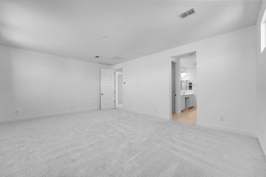 Representative unfurnished interior of a home built from the Lowell by Taylor Morrison in Combs Ranch Landmark Collection, San Tan Valley (Image 26).
