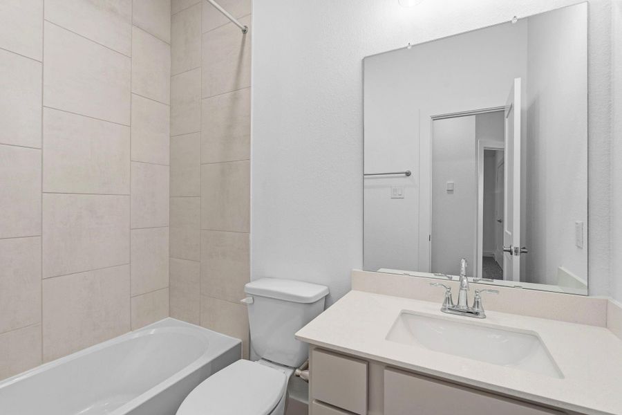 Furnished interior view inside a new home in Meridiana, Manvel (Image 10).