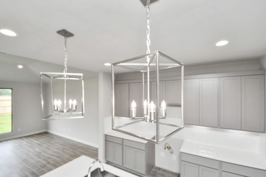 This generously spacious kitchen is a dream realized! Sample photo of completed home with similar floor plan. Actual colors and selections may vary.