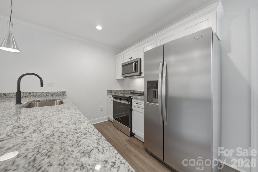 Furnished interior view inside a new home in , Hickory (Image 4).
