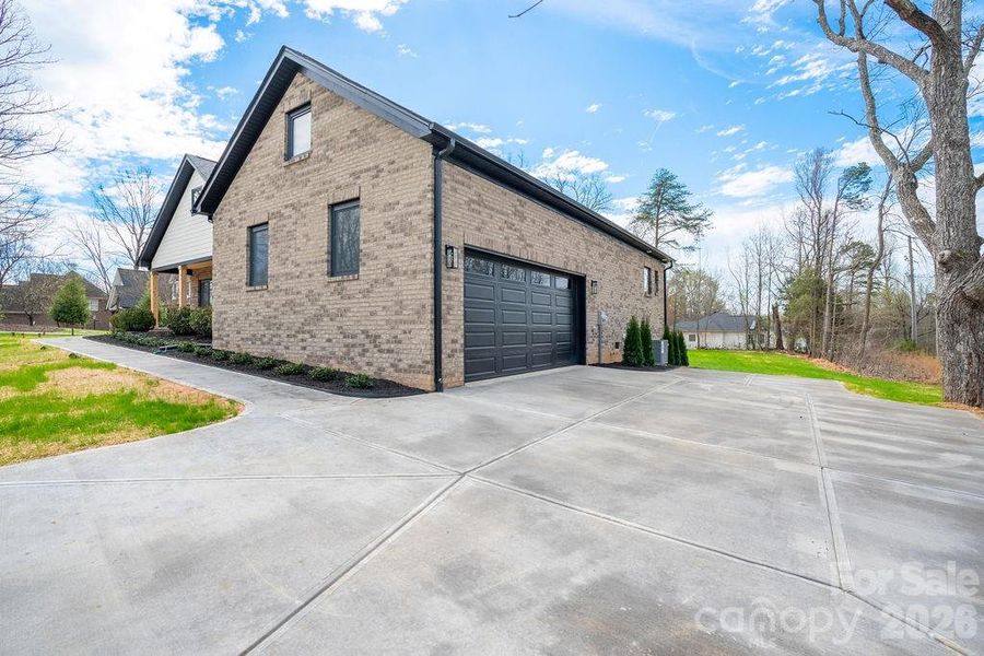 Front exterior of a new home in , Dallas, NC, highlighting curb appeal (Image 21).