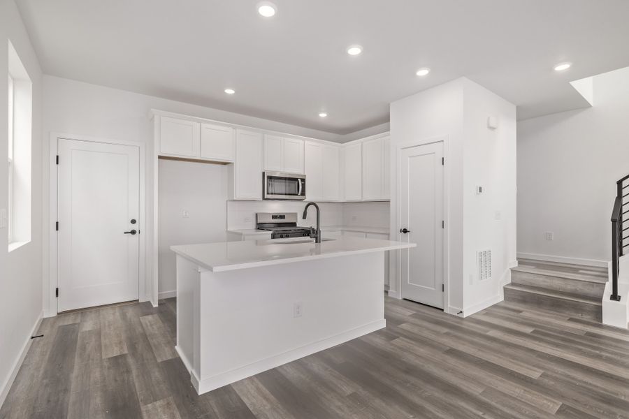 Furnished interior view inside a new home in Painted Prairie, Aurora (Image 7).