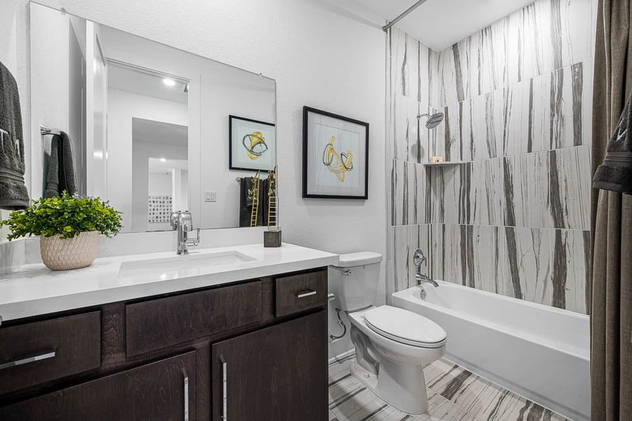 Furnished interior view inside a new home in Travisso, Leander (Image 28).