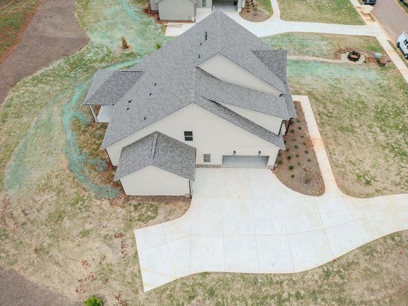 Front exterior of a new home in , Hoschton, GA, highlighting curb appeal (Image 28).
