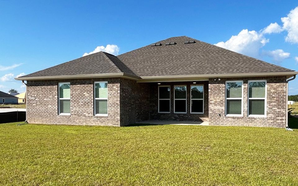 Exterior details and patio area of a home in Natureview, Freeport (Image 20).