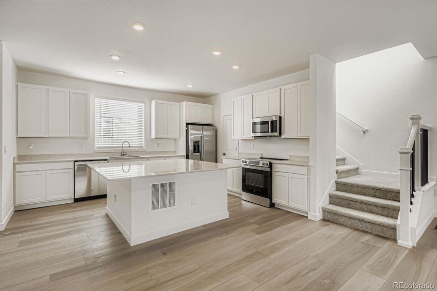Furnished interior view inside a new home in Vermilion Creek: The Skyline Collection, Centennial (Image 6).
