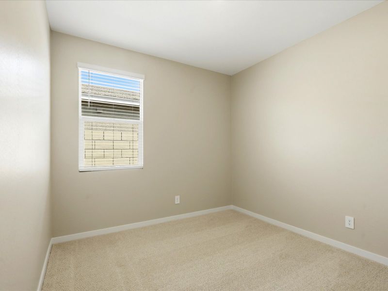 Spacious, unfurnished interior of a new home in White Tank Foothills Reserve Series, Waddell (Image 19).