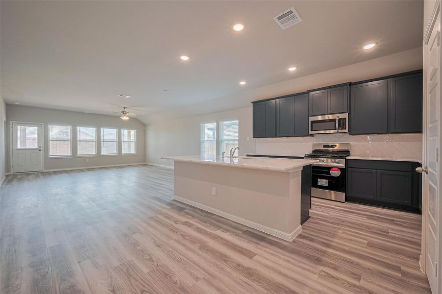 Furnished interior view inside a new home in Sunterra, Katy (Image 10). Furnished interior view inside a new home in Sunterra, Katy (Image 10).