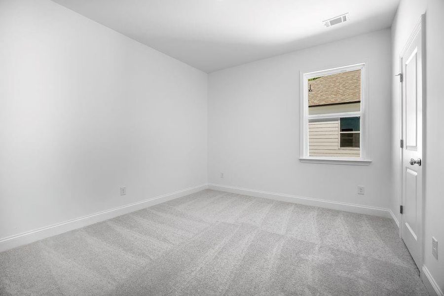 Spacious, unfurnished interior of a new home in Bailey Fence, Dacula (Image 22).