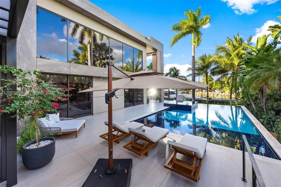 Exterior details and patio area of a home in , Miami (Image 24). Exterior details and patio area of a home in , Miami (Image 24).