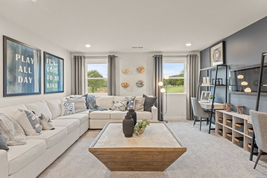 A living room with a large glass door.