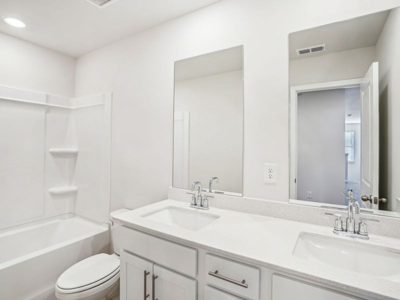 Furnished interior view inside a new home in Parkside at Grayson, Grayson (Image 8).