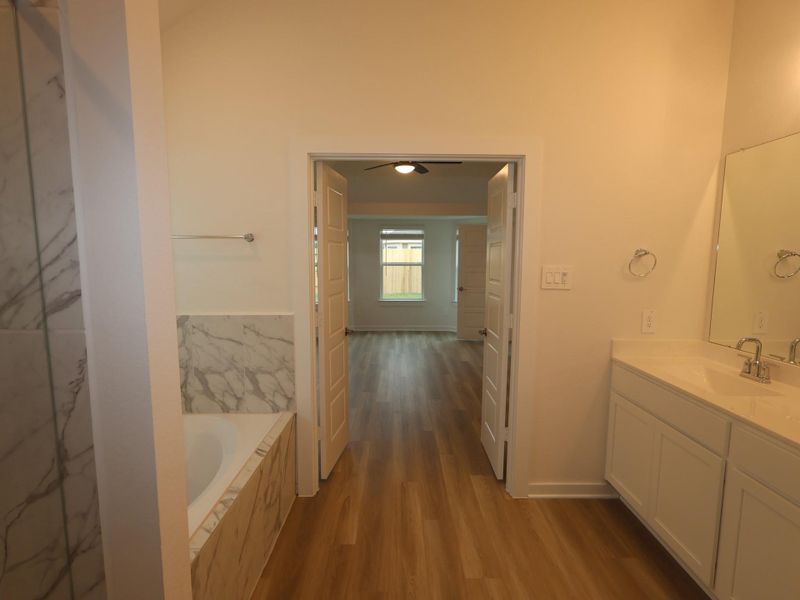 Furnished interior view inside a new home in Pinewood at Grand Texas, New Caney (Image 4).