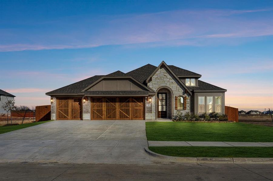 Front exterior of a new home in Sunrise at Garden Valley, Waxahachie, TX, highlighting curb appeal (Image 24).