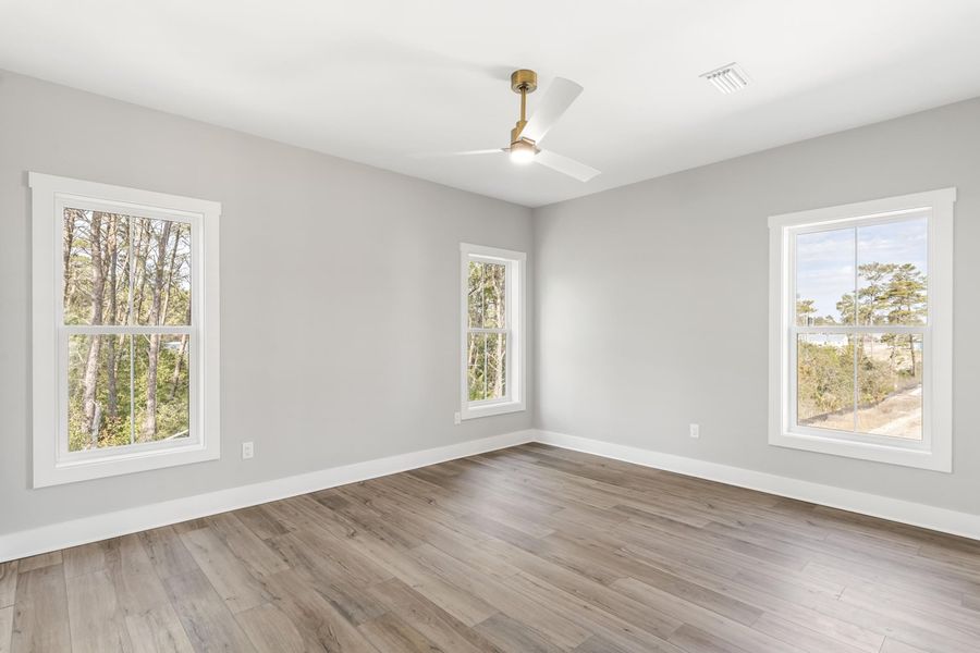 Representative unfurnished interior of a home built from the Pearl by Brock Built in Nautilus Pointe, Inlet Beach (Image 34).