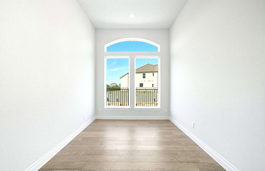 Representative unfurnished interior of a home built from the 3663 by Ravenna Homes in Artavia 70′, Conroe (Image 24).
