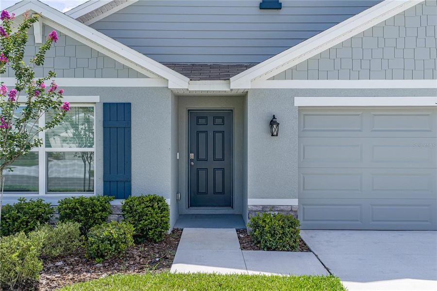 Exterior details and patio area of a home in Berry Bay, Wimauma (Image 4).