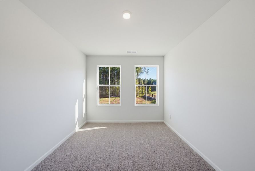Spacious, unfurnished interior of a new home in Sweetbrier, Durham (Image 27).