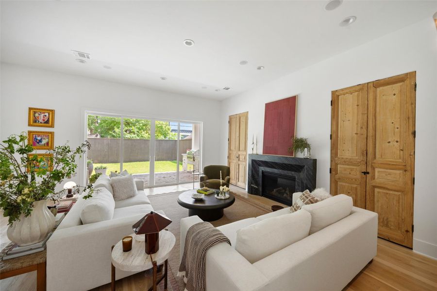 FAMILY ROOM WITH ABUNDANT LIGHT AND ANTIQUE DOORS FAMILY ROOM WITH ABUNDANT LIGHT AND ANTIQUE DOORS