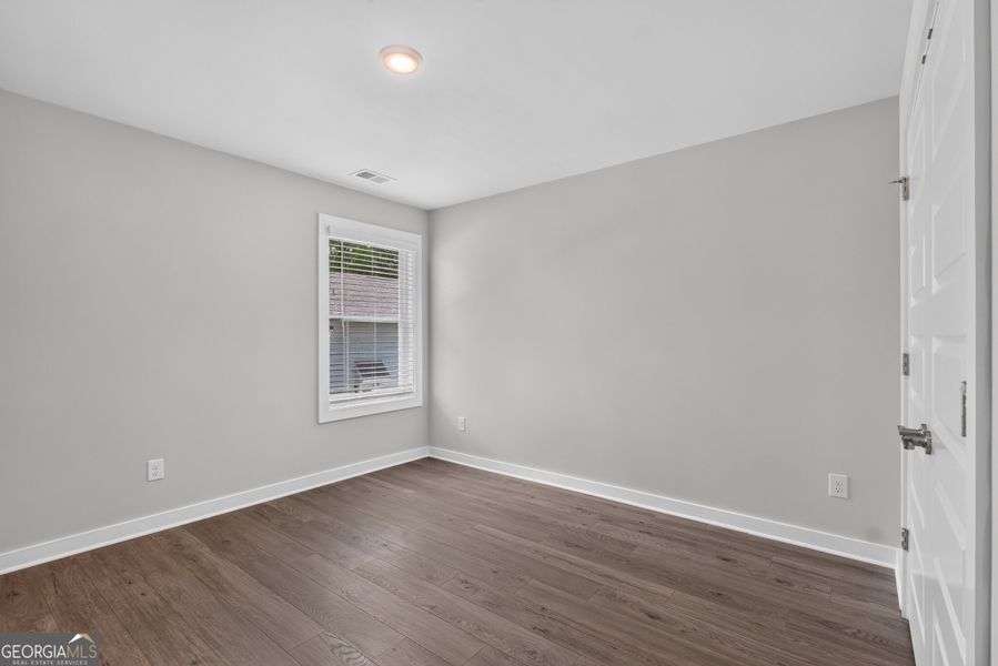 Spacious, unfurnished interior of a new home in The Cottages at East Lanier, Fayetteville (Image 17).