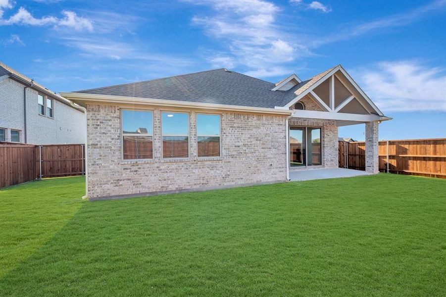 Exterior details and patio area of a home in Gateway Parks, Forney (Image 2). Exterior details and patio area of a home in Gateway Parks, Forney (Image 2).