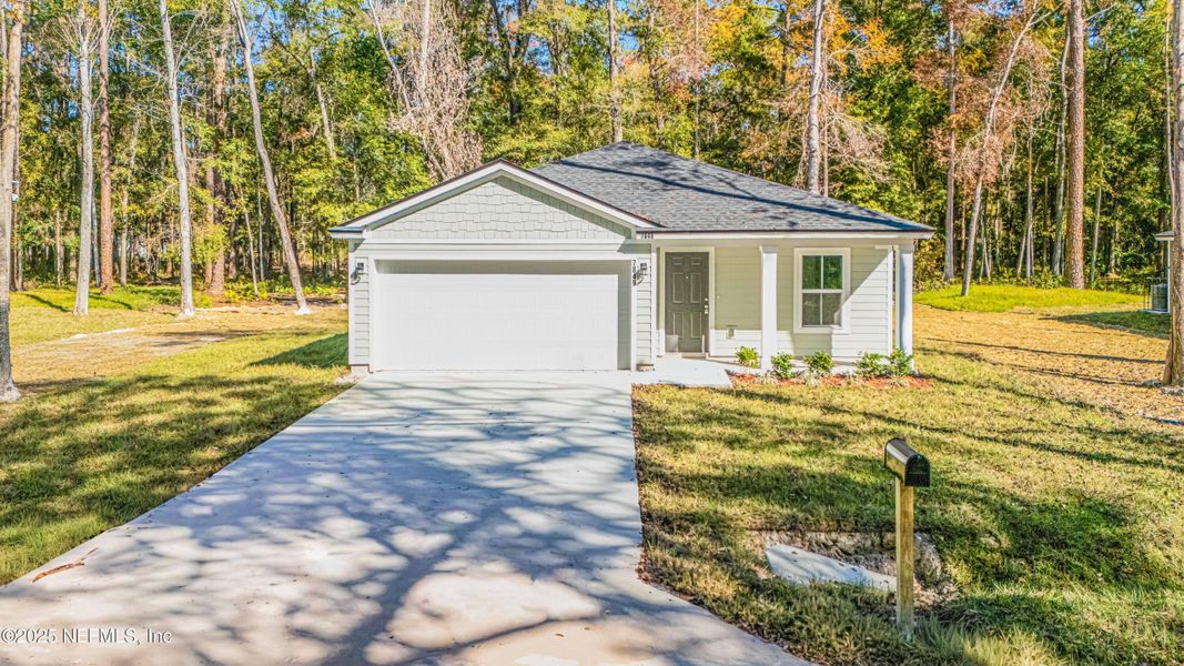 Front exterior of a new home in , Jacksonville, FL, highlighting curb appeal (Image 1). Front exterior of a new home in , Jacksonville, FL, highlighting curb appeal (Image 1).