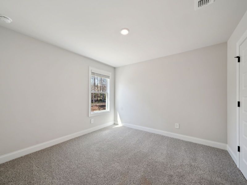 Spacious, unfurnished interior of a new home in Martin Springs - Estate Series, Lawrenceville (Image 18).