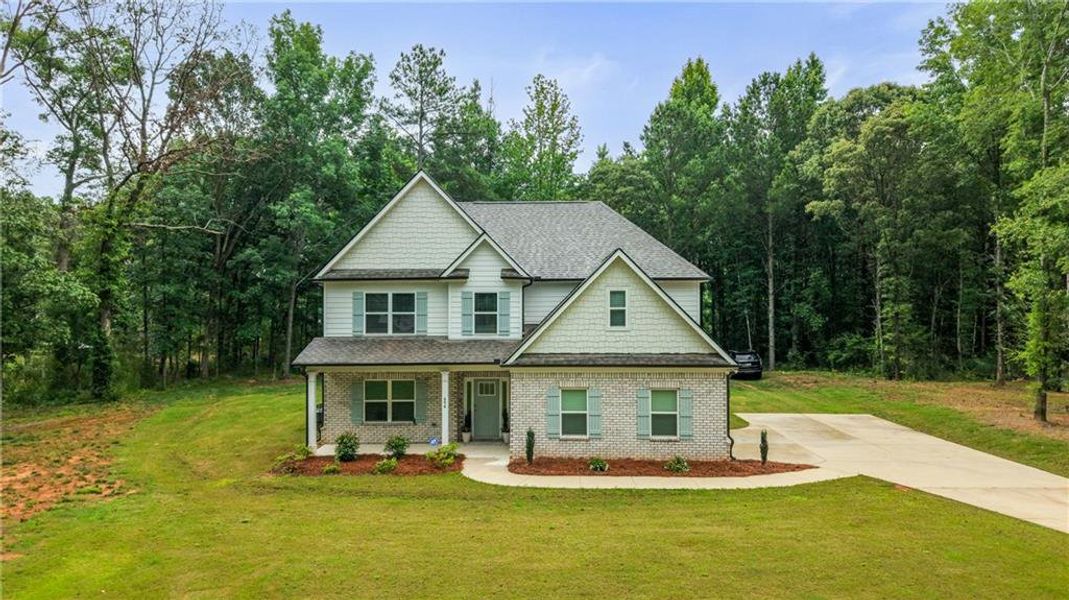 Front exterior of a new home in , McDonough, GA, highlighting curb appeal (Image 28).