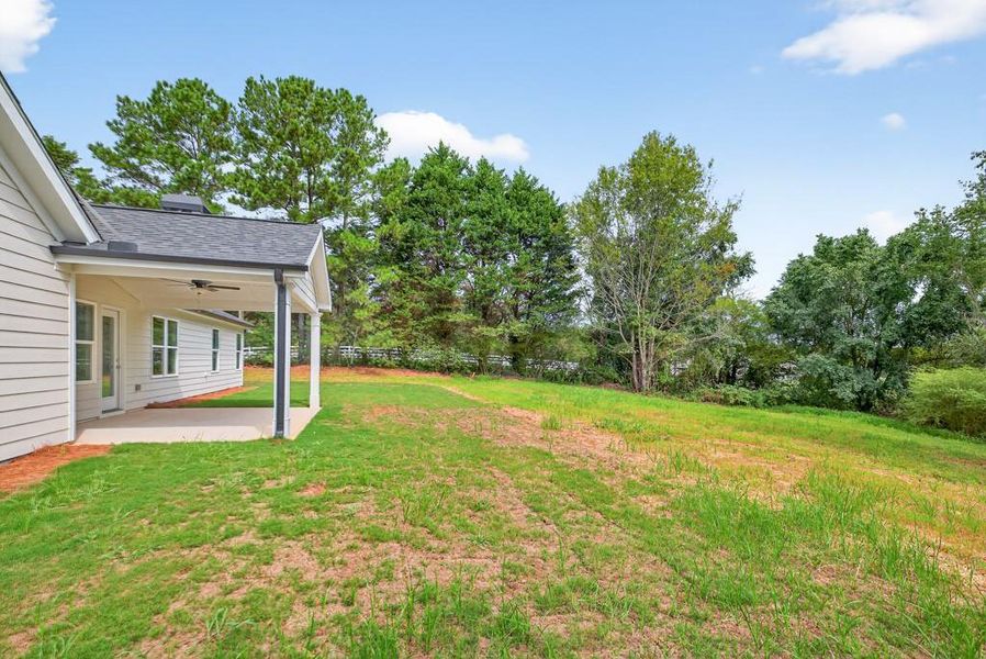 Front exterior of a new home in , Statham, GA, highlighting curb appeal (Image 22).