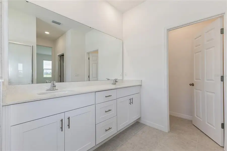 Furnished interior view inside a new home in Highfield at Twisted Oaks, Wildwood (Image 4).
