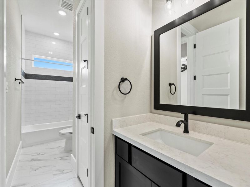 Jack and Jill bathroom connecting bedrooms 3&4 (sink for bedroom 3) Jack and Jill bathroom connecting bedrooms 3&4 (sink for bedroom 3)